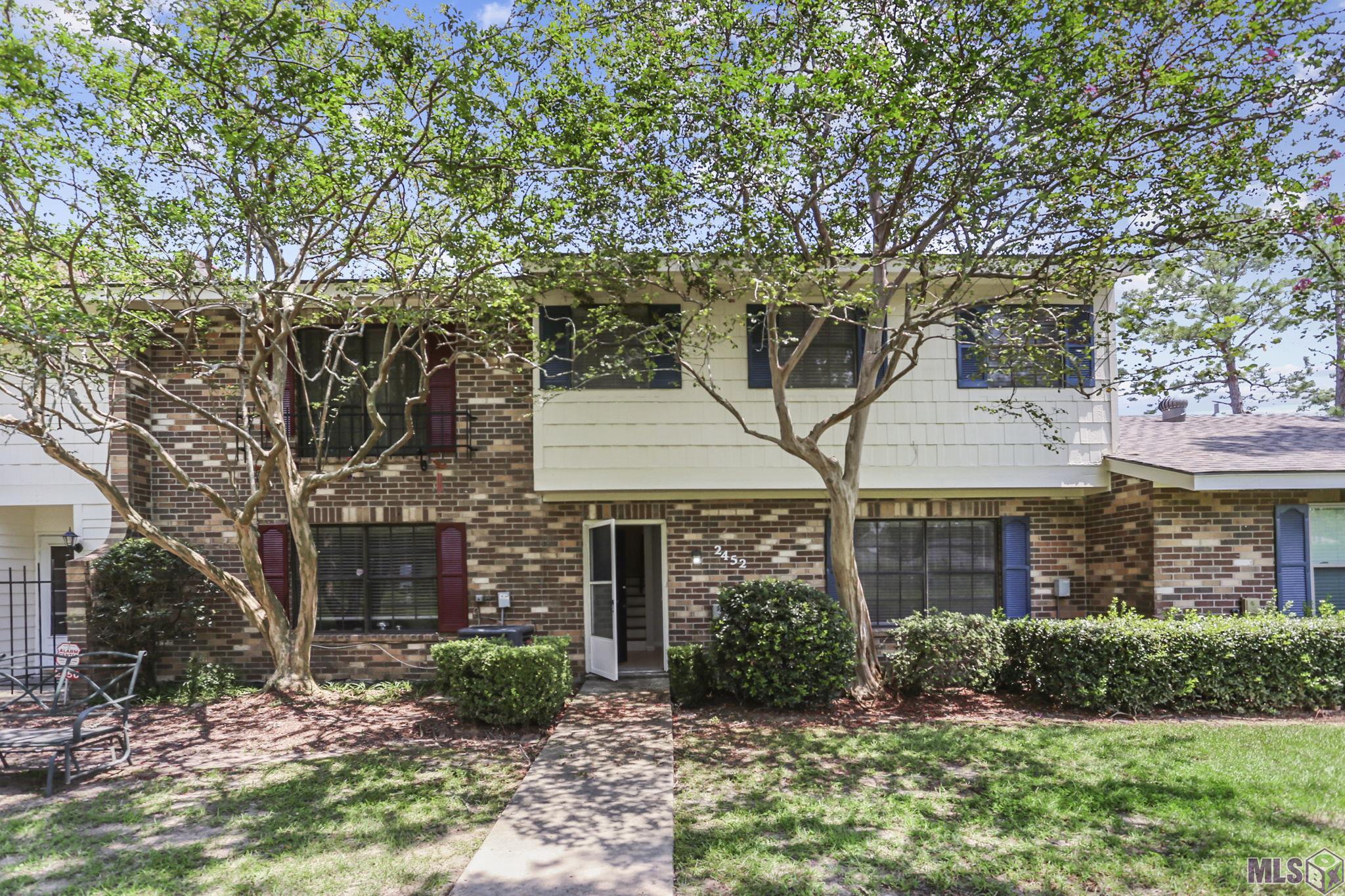 2452 Shadowbrook Drive Baton Rouge, LA 70816 - Photo 1 of 23 Front of townhome
