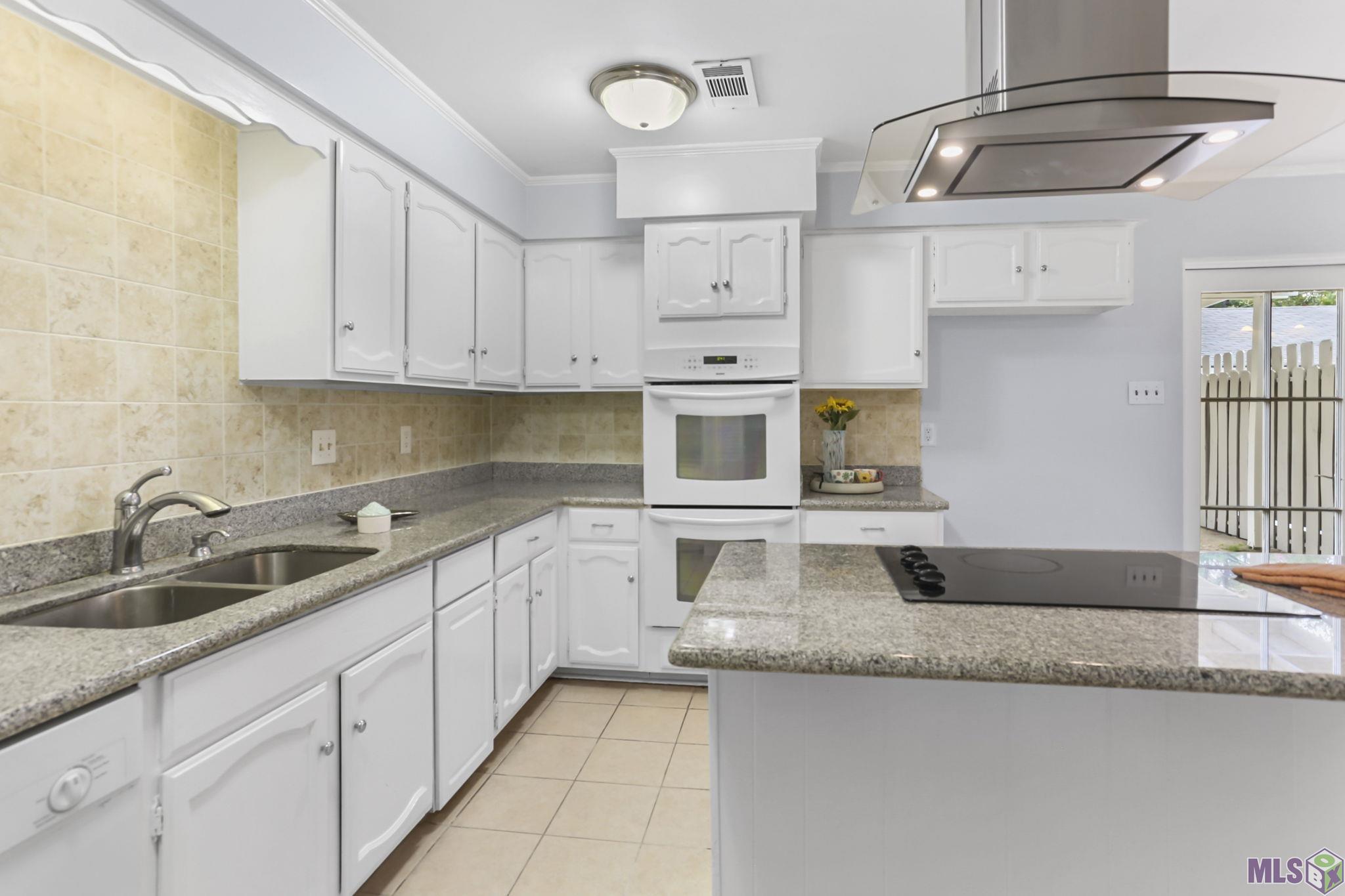 2452 Shadowbrook Drive Baton Rouge, LA 70816 - Photo 11 of 23 Plenty of cabinets