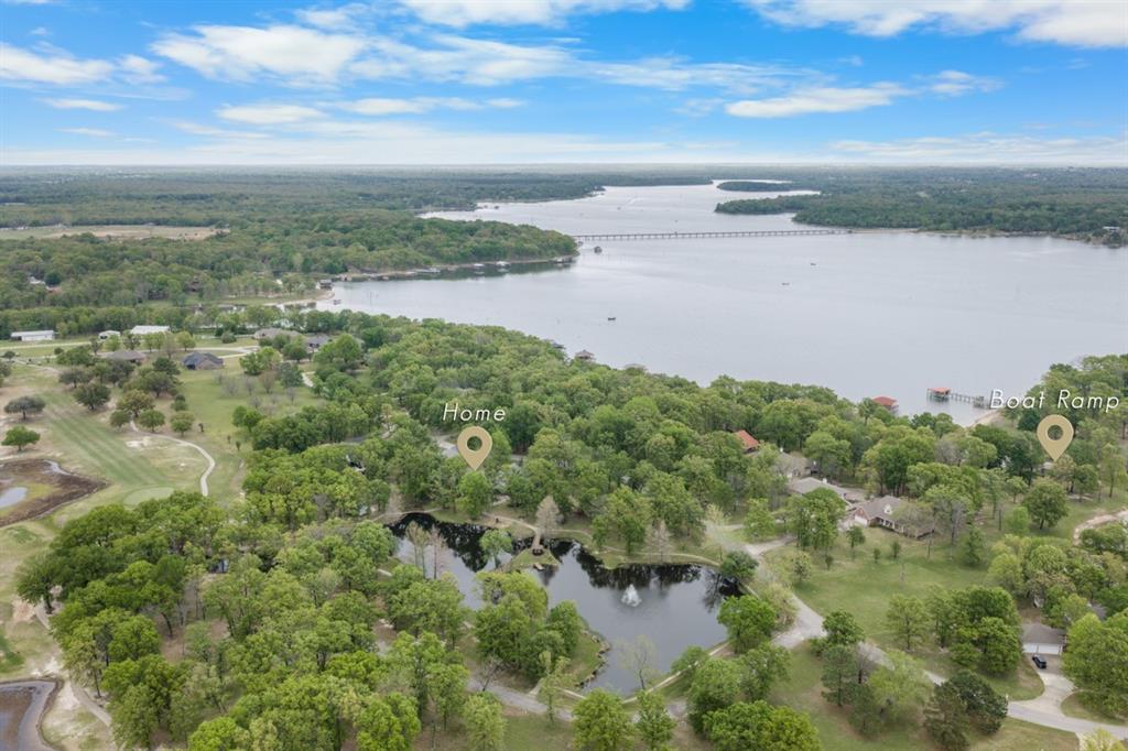 692 Private Road 5937 Emory, TX 75440 - Photo 40 of 40 a view of a lake with a yard