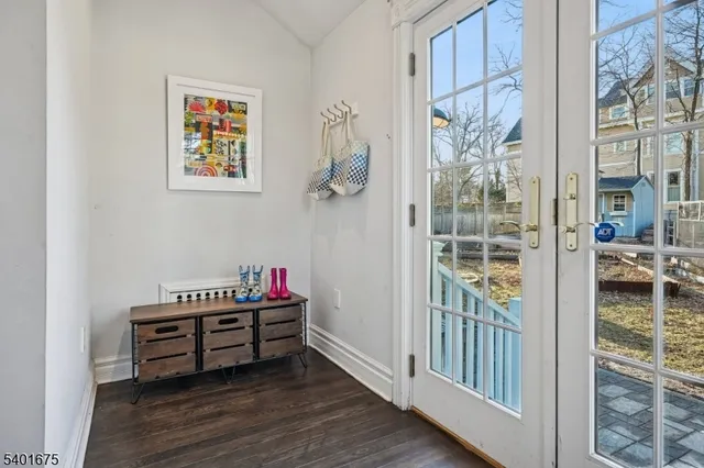 a room with furniture and wooden floor