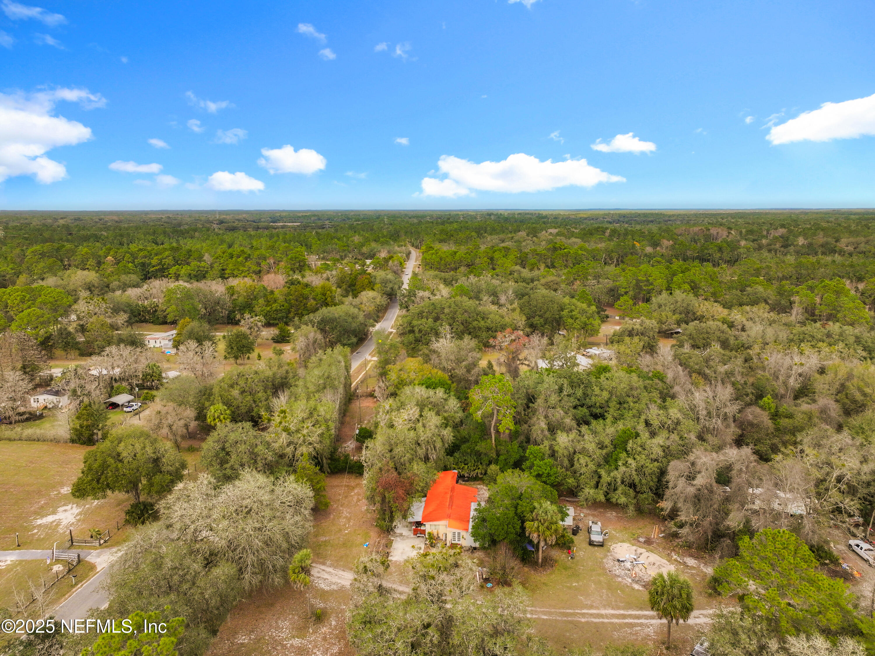 22695 Northeast 130th Court Road Fort McCoy, FL 32134 - Photo 17 of 22 a view of an outdoor space and a lake view