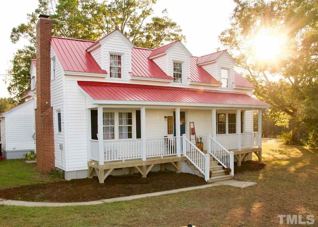 2120 Mary Hobby Road Raleigh, NC 27603 - Photo 1 of 30 a front view of a house with a yard