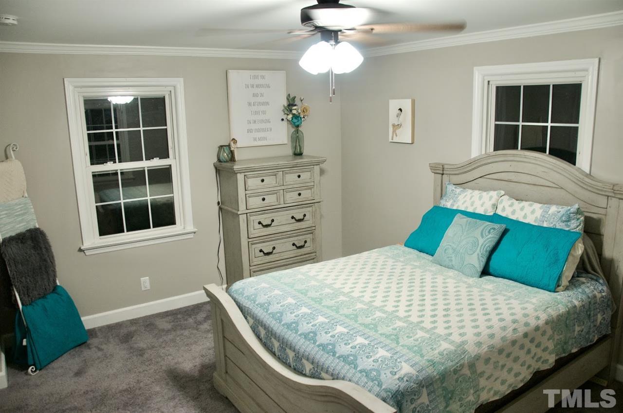 2120 Mary Hobby Road Raleigh, NC 27603 - Photo 16 of 30 a bedroom with a bed and window