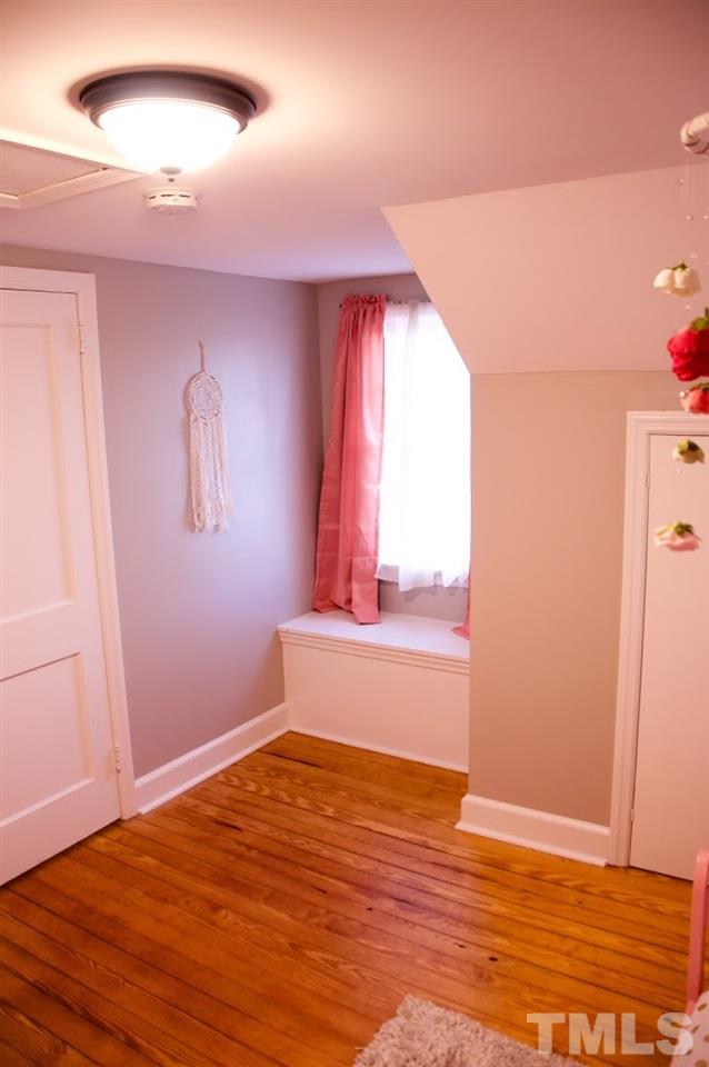 2120 Mary Hobby Road Raleigh, NC 27603 - Photo 25 of 30 a view of empty room with window and wooden floor