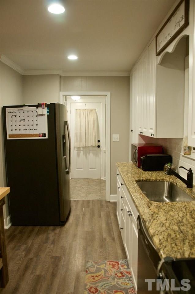 2120 Mary Hobby Road Raleigh, NC 27603 - Photo 7 of 30 a kitchen with refrigerator and window