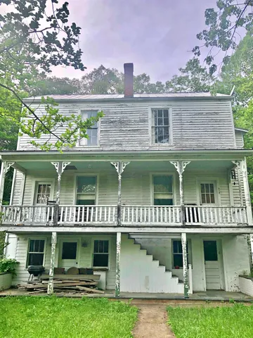 front view of a house with a porch
