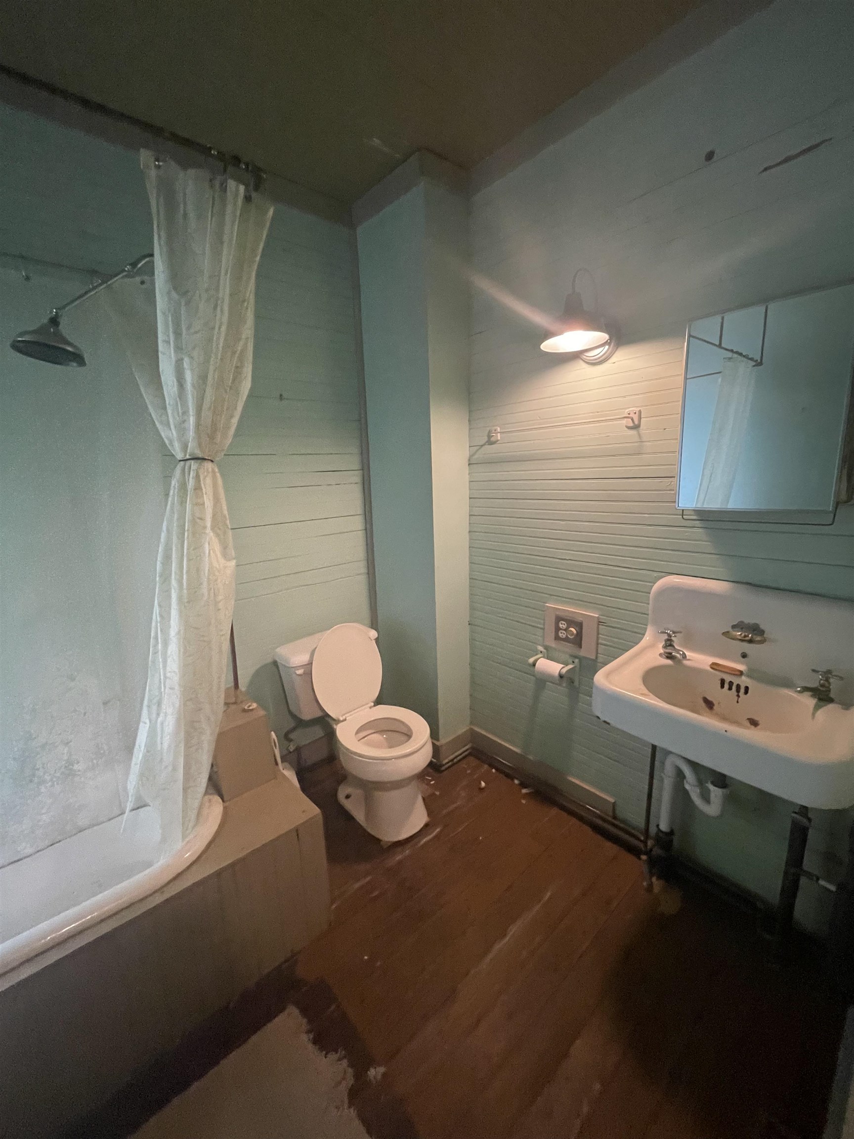 9264 Schuyler Road Schuyler, VA 22969 - Photo 18 of 20 a bathroom with a toilet sink and mirror