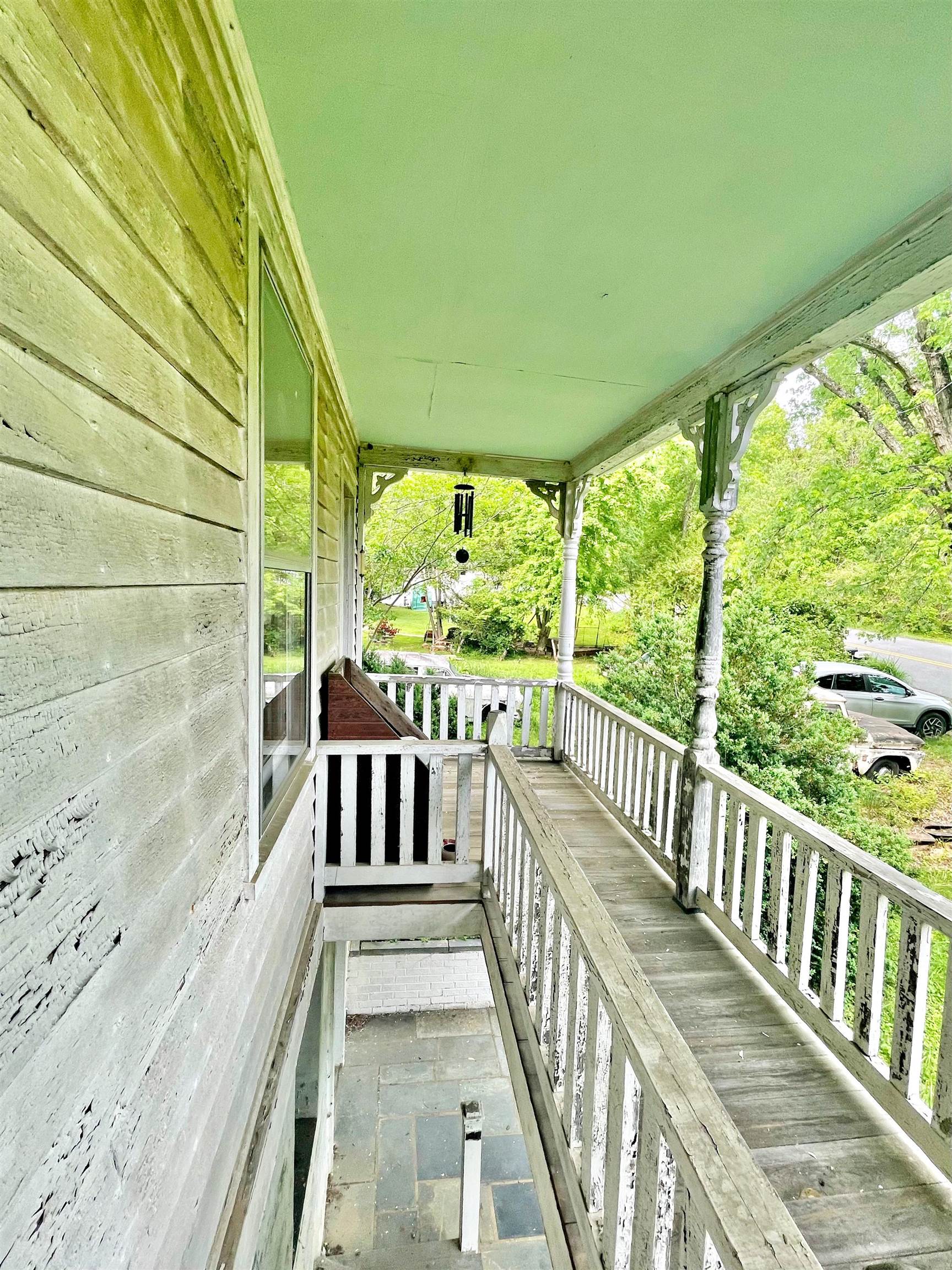 9264 Schuyler Road Schuyler, VA 22969 - Photo 6 of 20 a view of a balcony with furniture