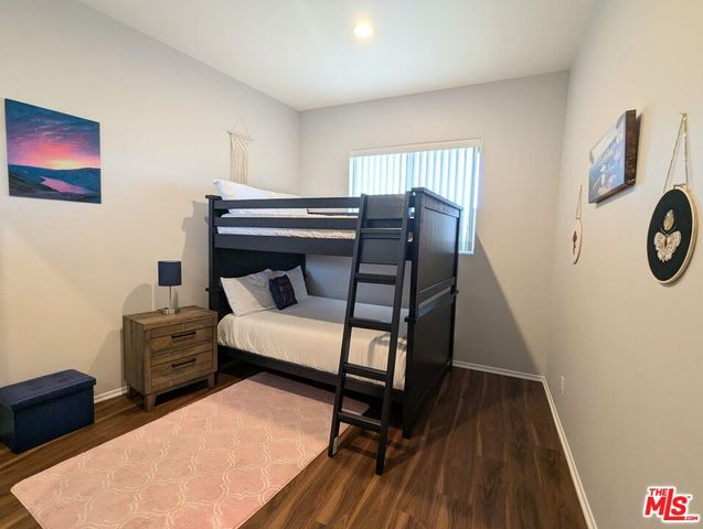 a spacious bathroom with a tub and shower