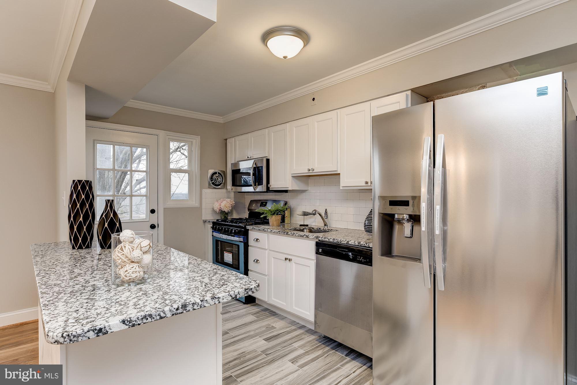 5524 Channing Road Baltimore, MD 21229 - Photo 12 of 28 Stainless steel gourmet appliances