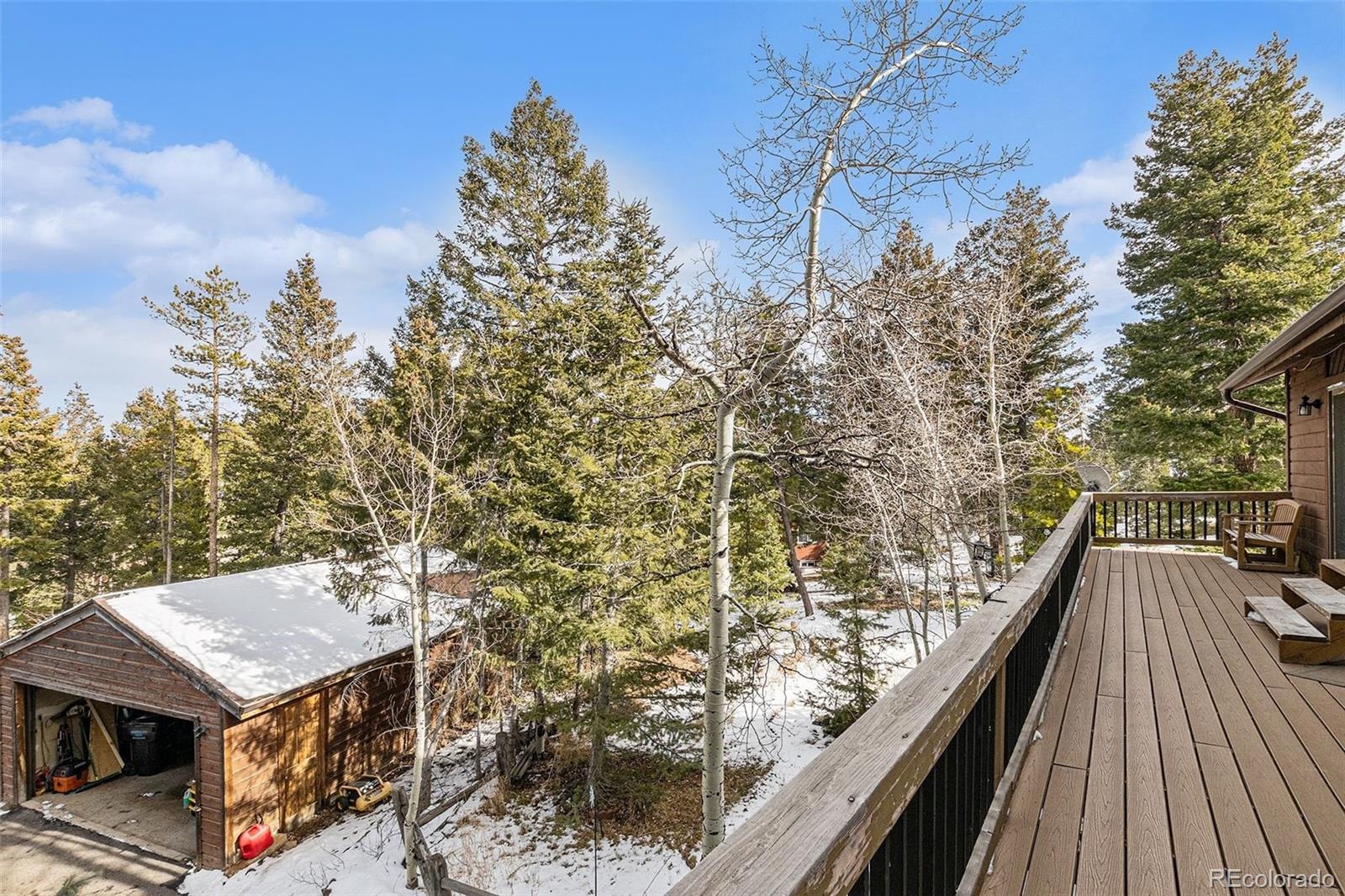 22296 Cook Lane Morrison, CO 80465 - Photo 11 of 19 a view of a balcony with an outdoor space