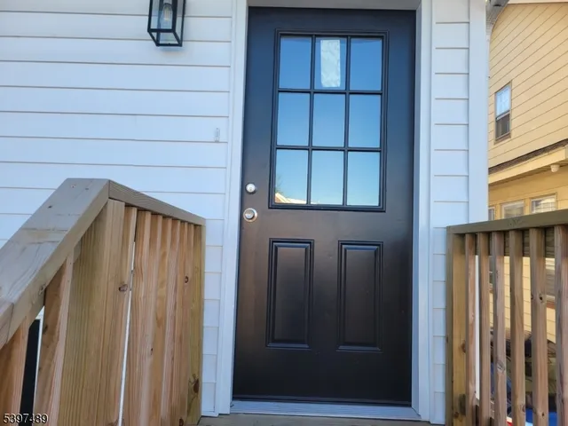 a front view of a house with a door