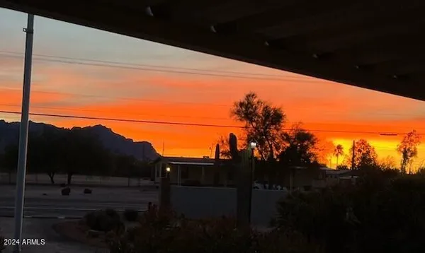 a backyard of a house with wooden fence
