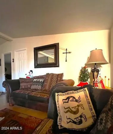 a living room with furniture and a couch