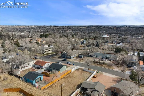 an aerial view of a city with lots of residential buildings