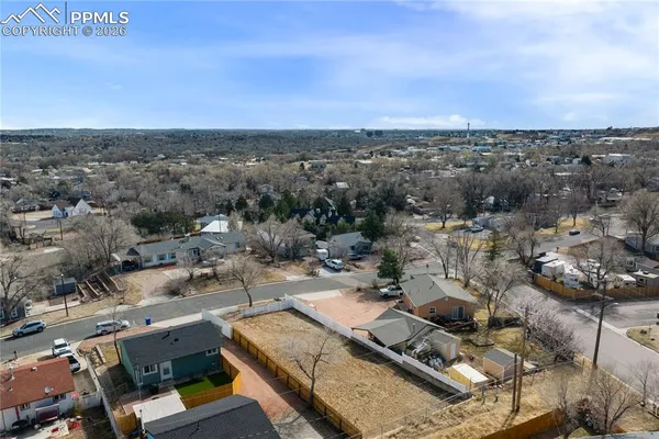 an aerial view of a city with lots of residential buildings