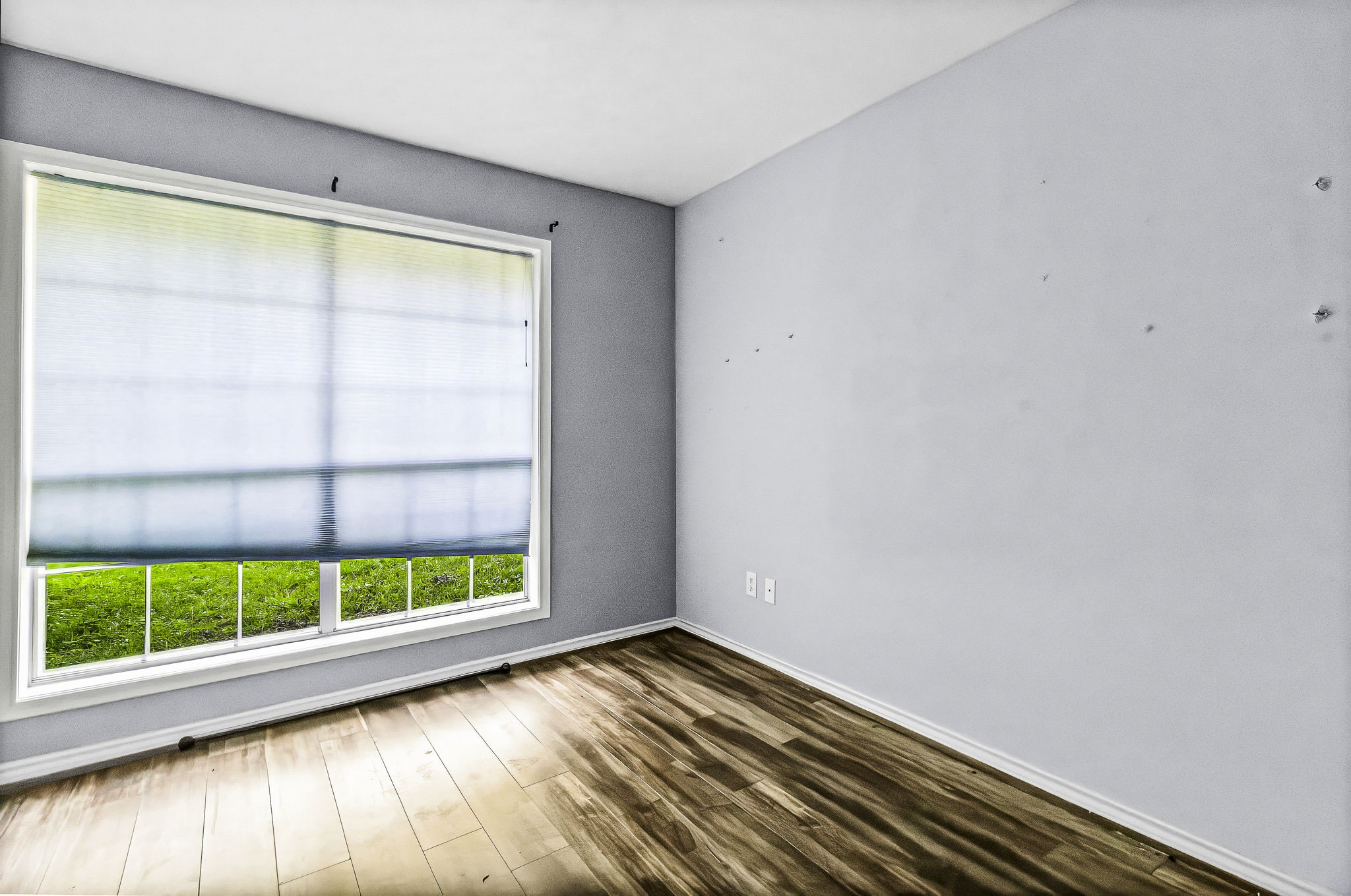 6 Lost Forest Trinity, TX 75862 - Photo 17 of 29 a view of empty room with wooden floor and fan