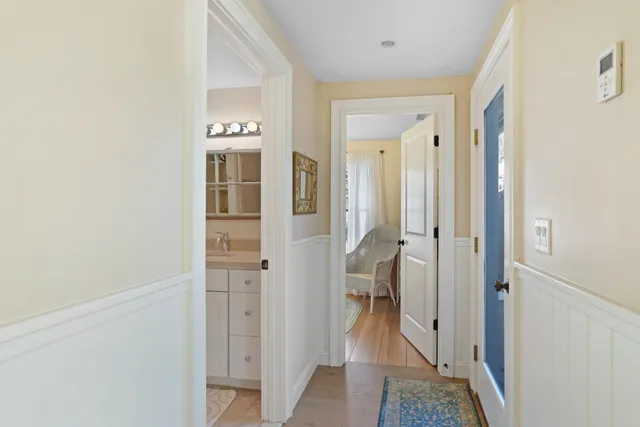 a bathroom with a glass door shower