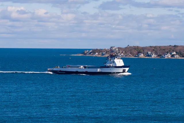 an aerial view of a houses with yard