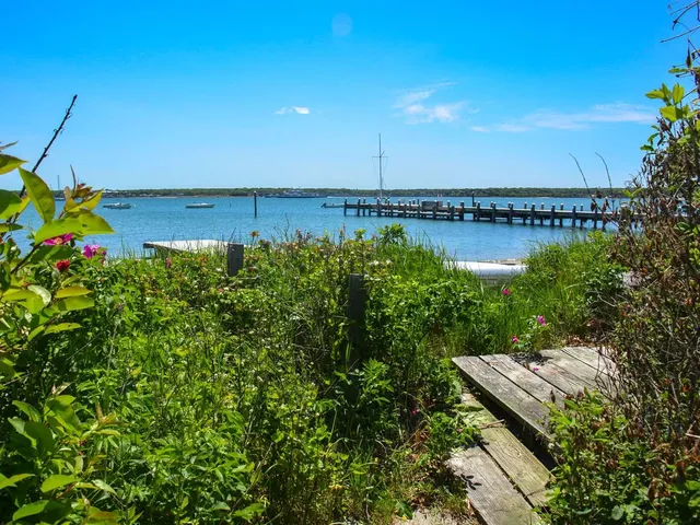 a view of a lake with a outdoor space