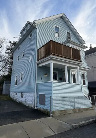 a front view of a house with a garage