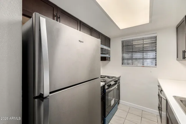 a kitchen with a stove and a microwave