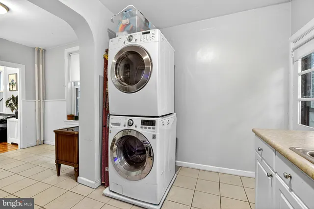 a view of a living room and a flat screen tv