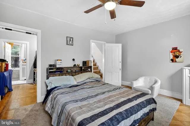 a view of game room with window and ceiling fan