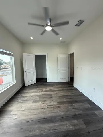 a view of an empty room with a window