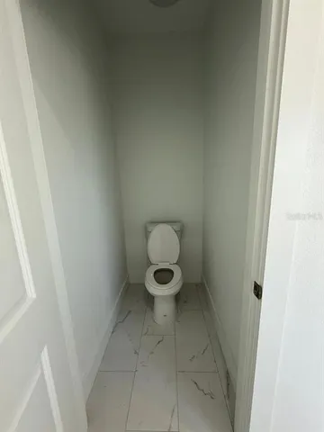 a bathroom with a toilet