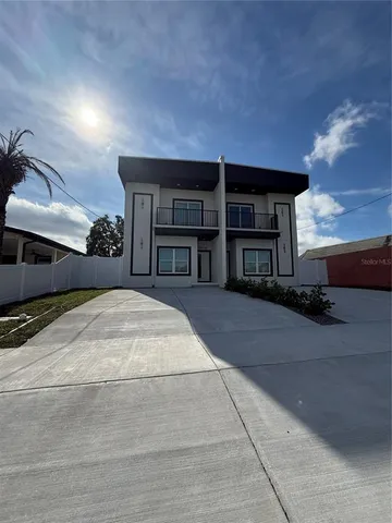 a house view with a backyard space