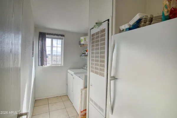 a view of storage and utility room