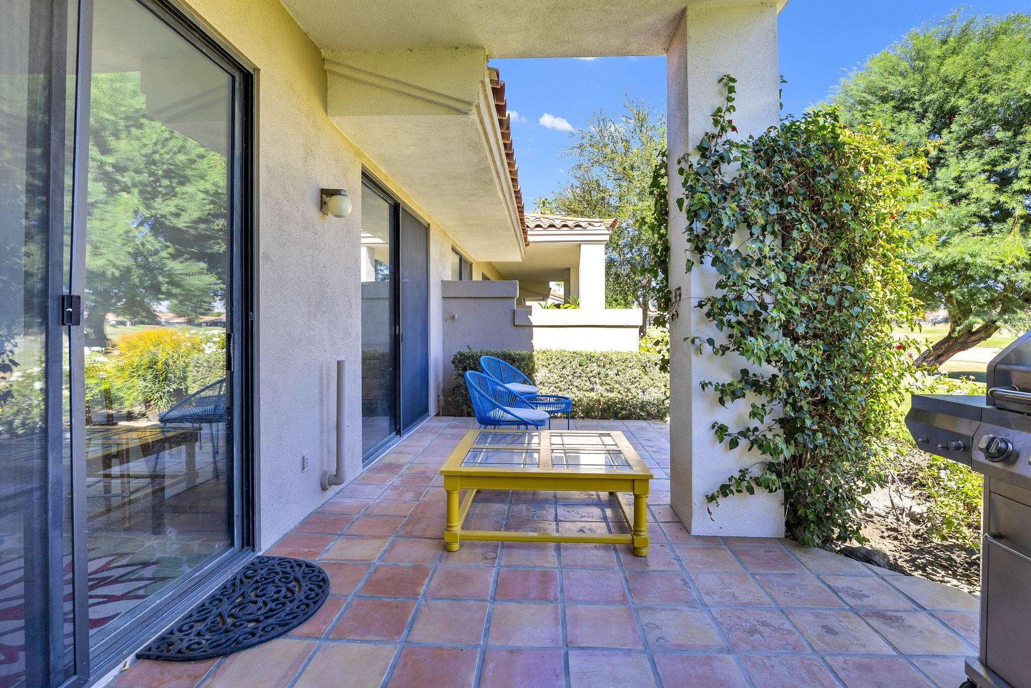 54880 Inverness Way La Quinta, CA 92253 - Photo 18 of 20 a view of staircase with a chair and potted plants