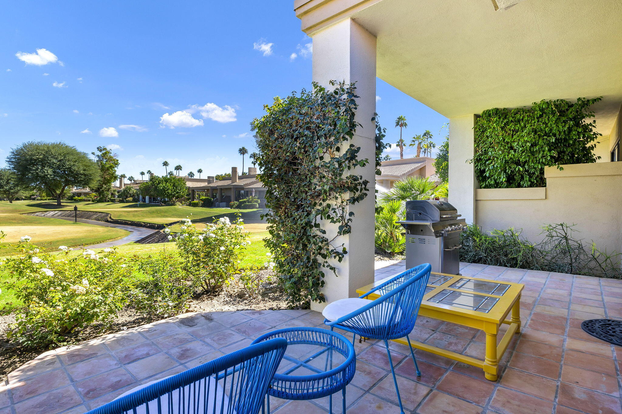 54880 Inverness Way La Quinta, CA 92253 - Photo 19 of 20 a view of a bench in a backyard of a house
