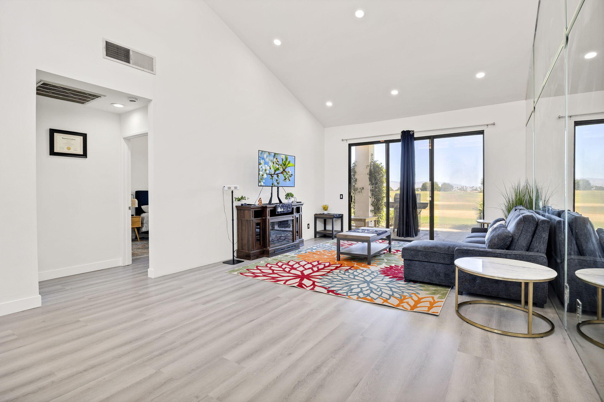 54880 Inverness Way La Quinta, CA 92253 - Photo 3 of 20 a living room with furniture and a wooden floor