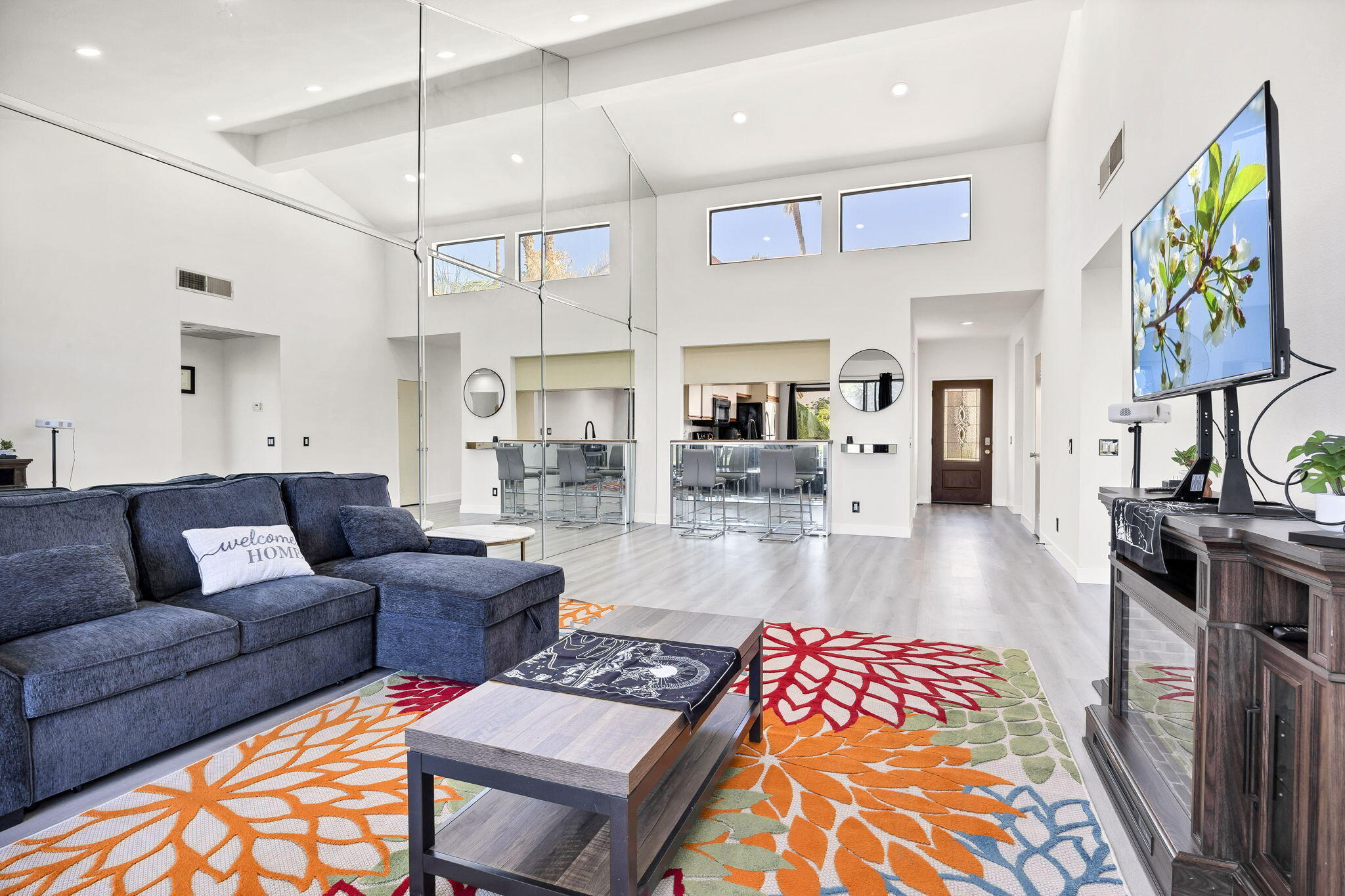54880 Inverness Way La Quinta, CA 92253 - Photo 4 of 20 a living room with furniture fireplace and flat screen tv