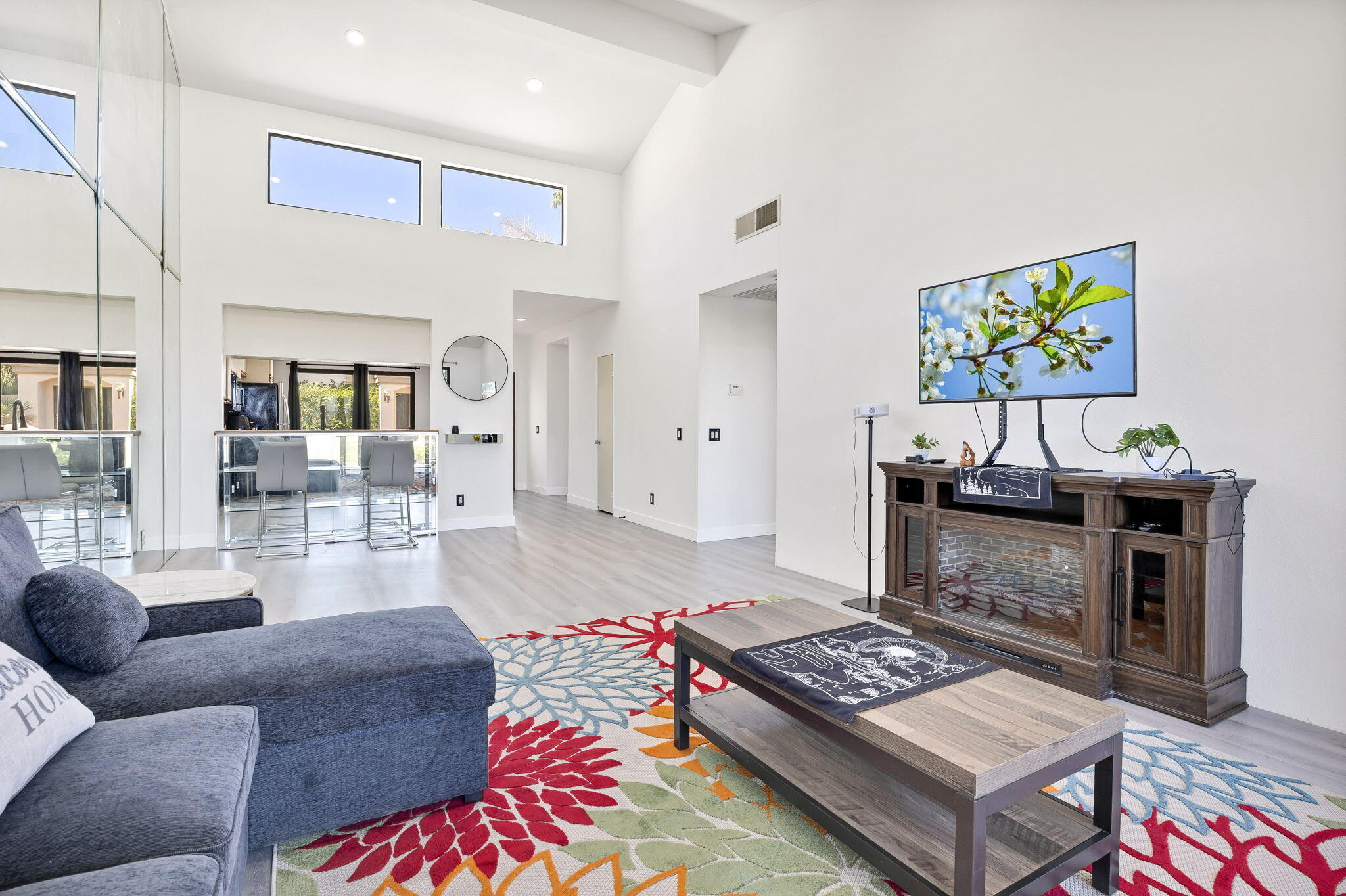 54880 Inverness Way La Quinta, CA 92253 - Photo 5 of 20 a living room with furniture and a fireplace