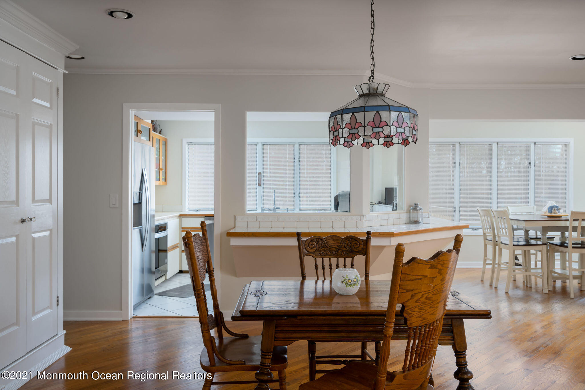 1759 Todd Road Toms River, NJ 08755 - Photo 14 of 58 a dining room with a wooden table and chairs