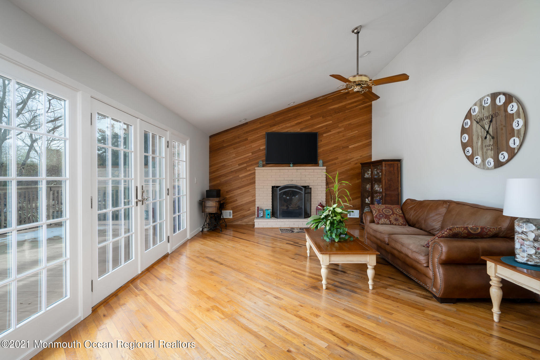 1759 Todd Road Toms River, NJ 08755 - Photo 18 of 58 a living room with furniture a window and a fireplace