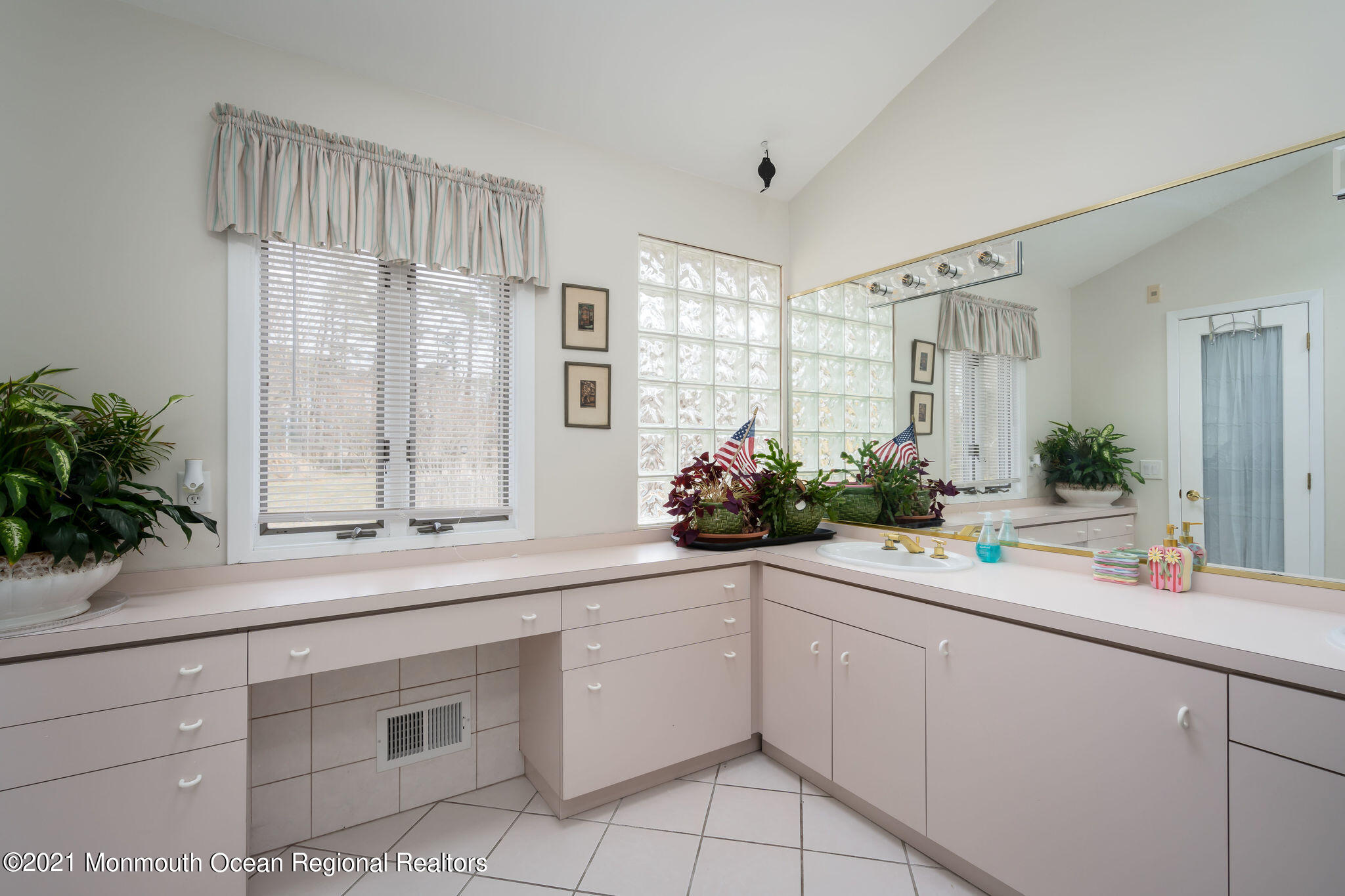 1759 Todd Road Toms River, NJ 08755 - Photo 23 of 58 a sink with white cabinets and potted plant