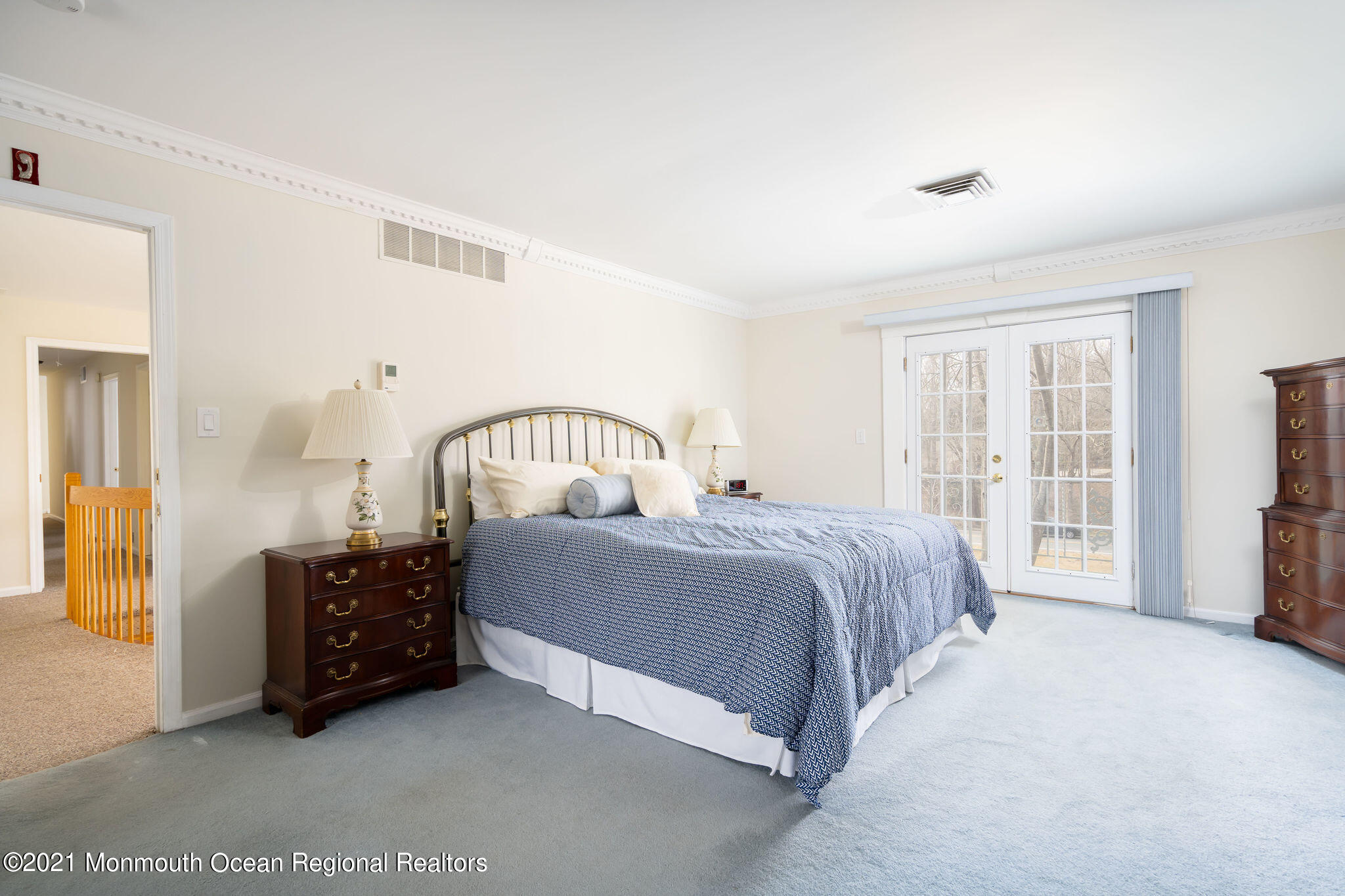 1759 Todd Road Toms River, NJ 08755 - Photo 25 of 58 a spacious bedroom with a bed a mirror and dresser
