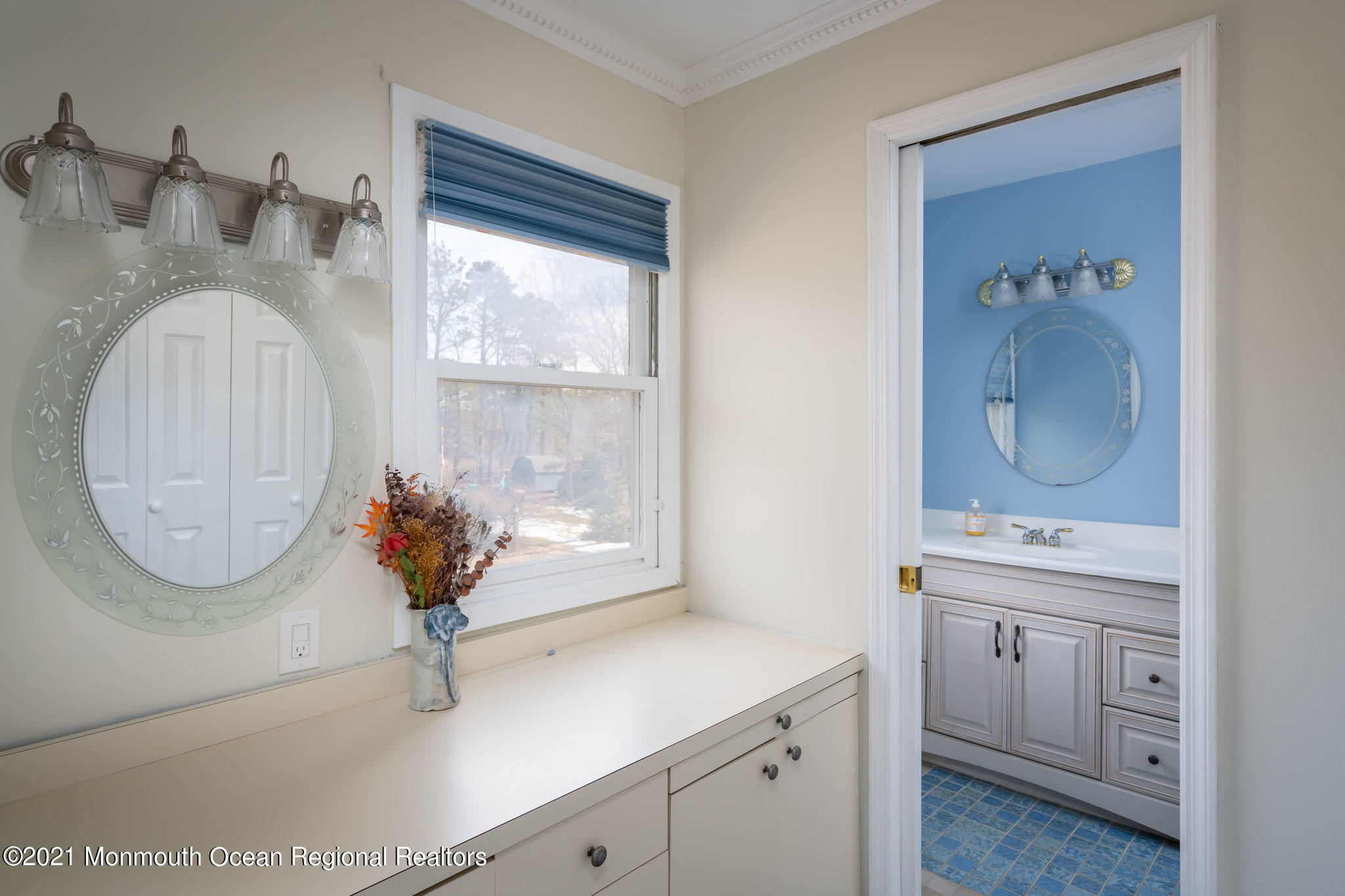 1759 Todd Road Toms River, NJ 08755 - Photo 28 of 58 a bathroom with a sink a mirror and a shower