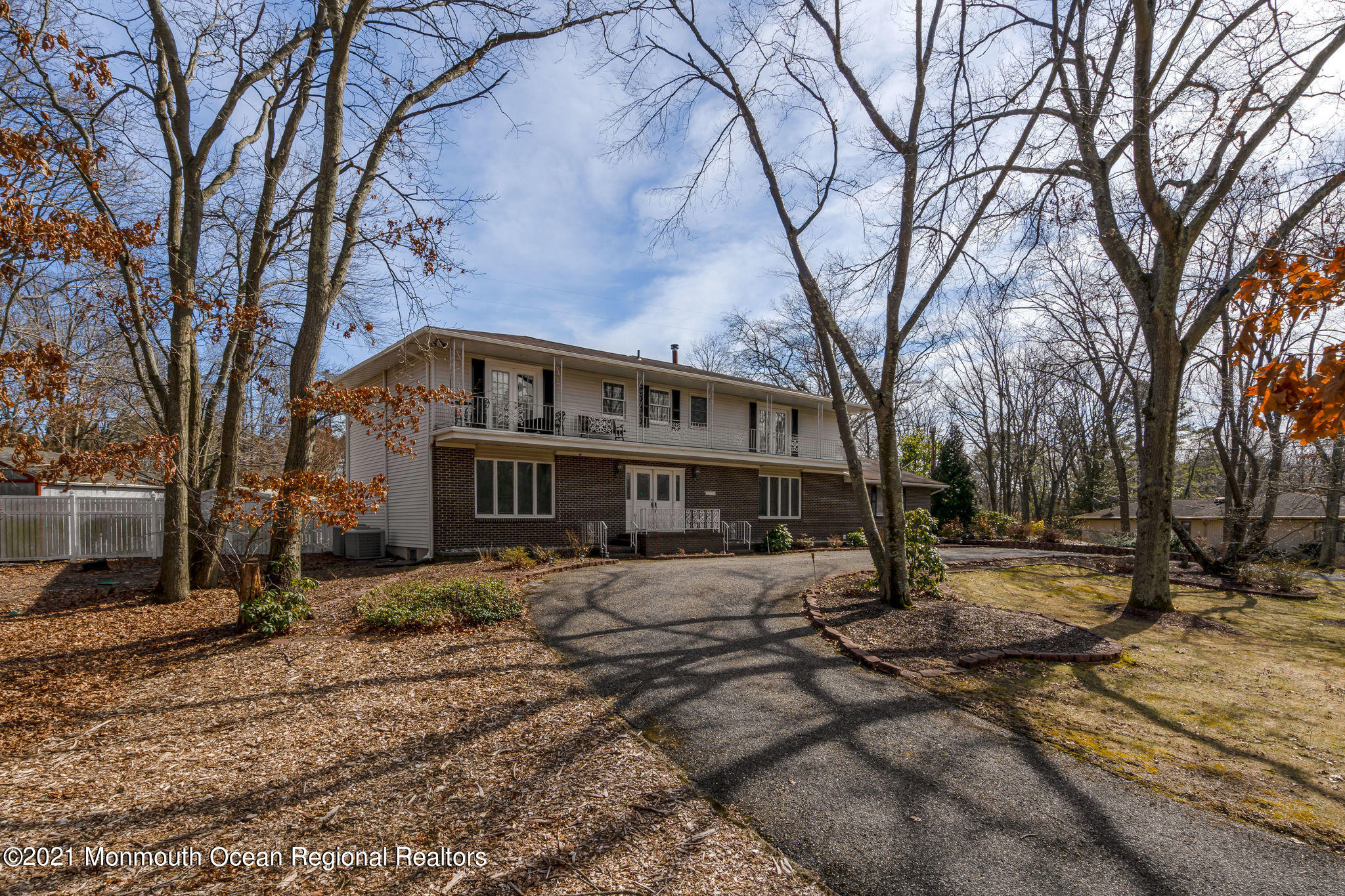 1759 Todd Road Toms River, NJ 08755 - Photo 4 of 58 a view of a house with a yard covered in snow