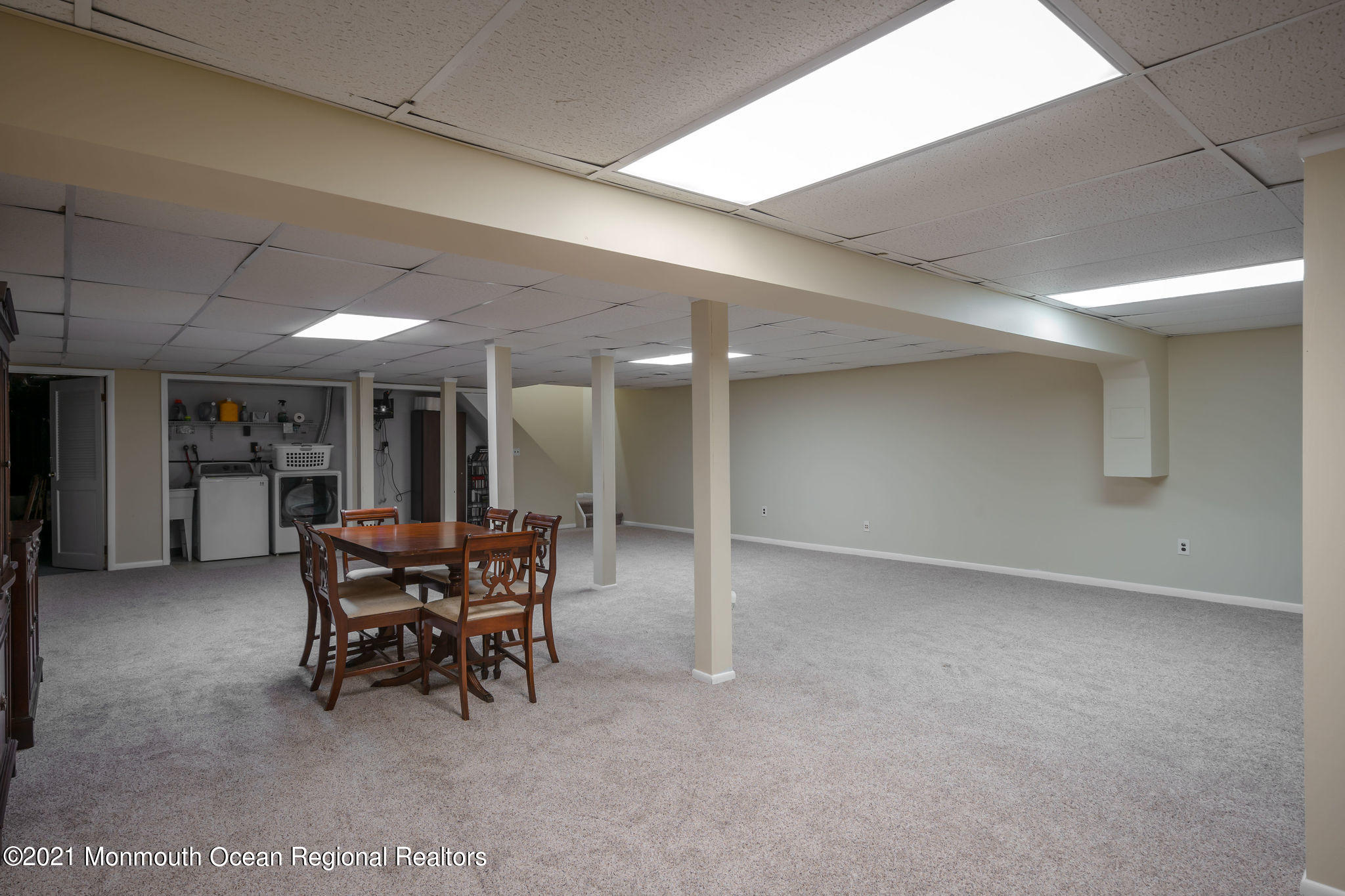 1759 Todd Road Toms River, NJ 08755 - Photo 35 of 58 a dining room with furniture and a potted plant