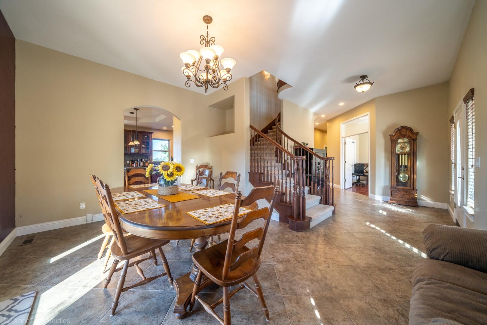 12339 Fern Road Whitmore, CA 96096 - Photo 31 of 152 a view of a dining room with furniture and chandelier