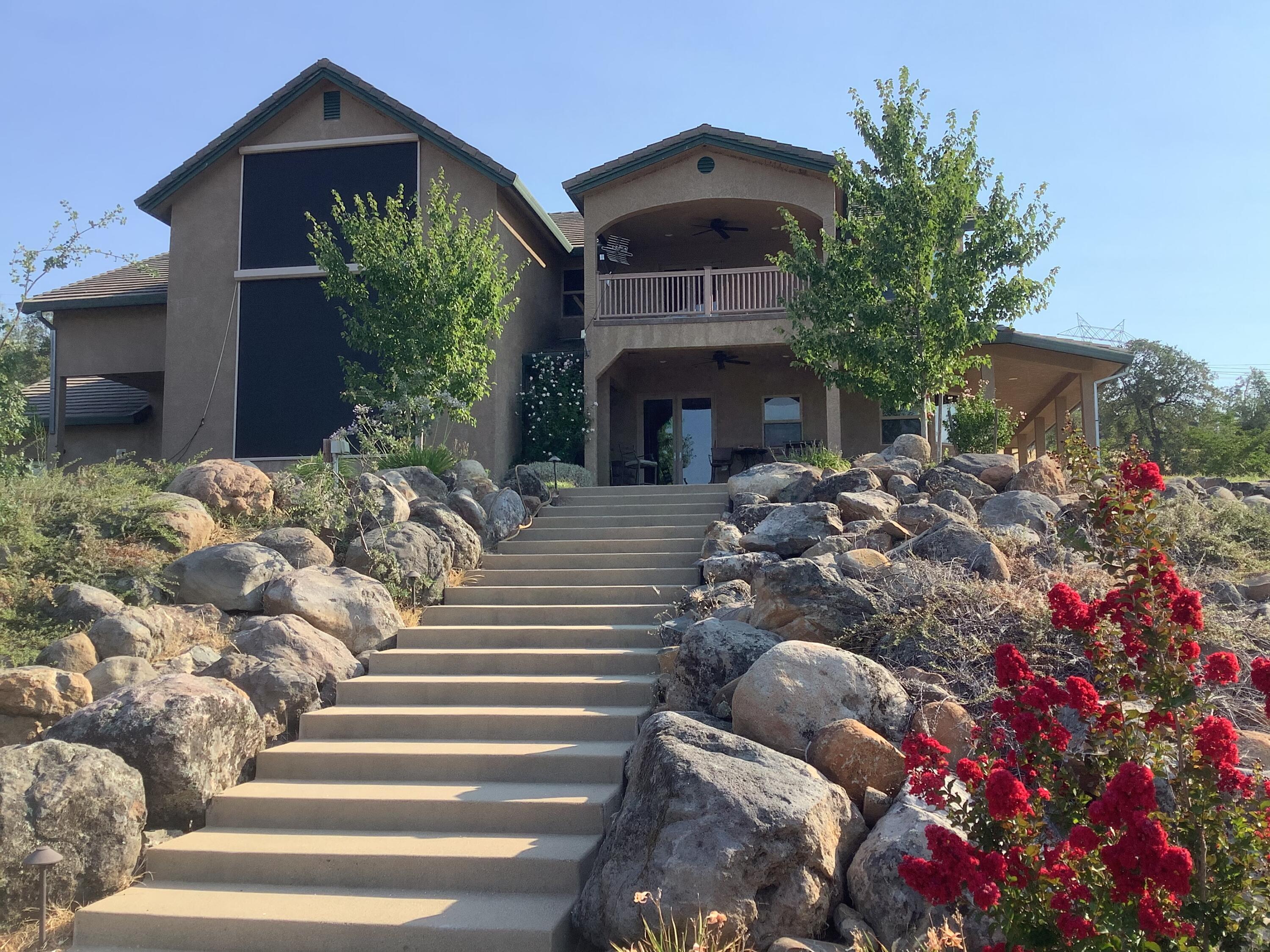 12339 Fern Road Whitmore, CA 96096 - Photo 4 of 152 a front view of a house with a yard
