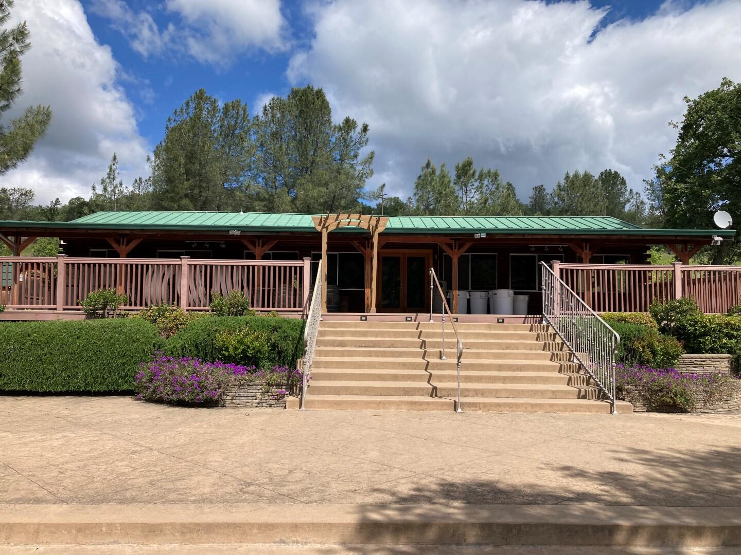 12339 Fern Road Whitmore, CA 96096 - Photo 46 of 152 a front view of a house with a garden
