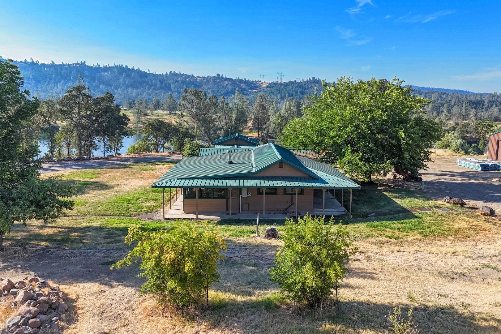 12339 Fern Road Whitmore, CA 96096 - Photo 69 of 152 a front view of a house with a yard