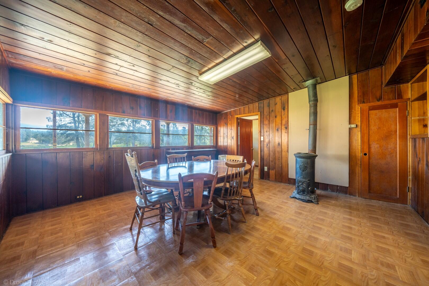 12339 Fern Road Whitmore, CA 96096 - Photo 77 of 152 a view of a dining room with furniture window and wooden floor
