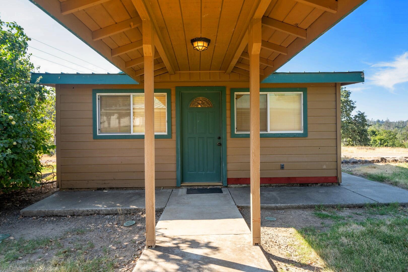 12339 Fern Road Whitmore, CA 96096 - Photo 82 of 152 a view of a entryway door of the house